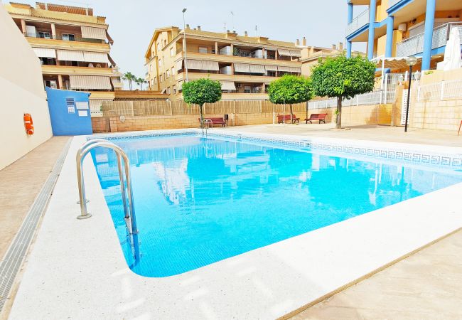 Apartamento en Canet d´en berenguer - Global Properties: Apartamento con piscina y terraza en Canet playa
