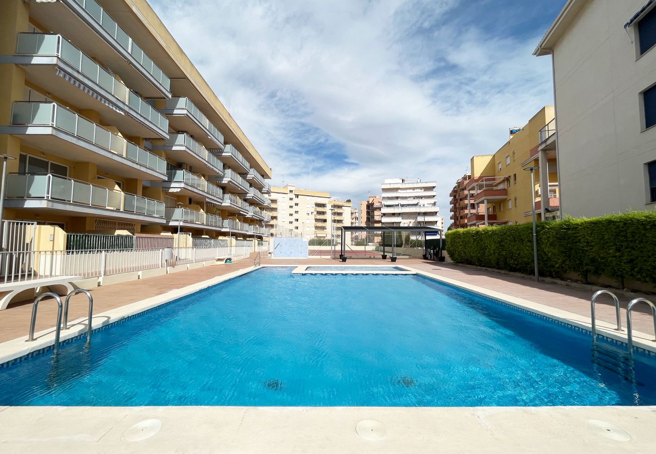 Apartamento en Canet d´en berenguer - Global Properties: Piso práctico, con terraza y piscina en la playa de Canet