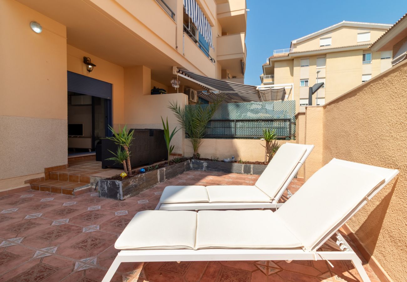 Apartamento en Canet d´en berenguer - Global Properties: Planta baja con terraza cerca de la playa