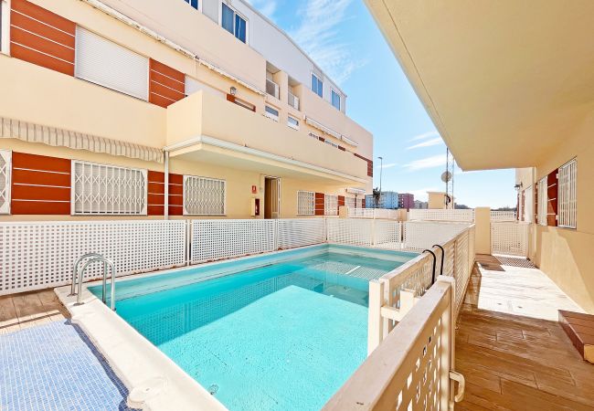  in Canet d´en berenguer - Global Properties: Practical flat with swimming pool in Canet Beach